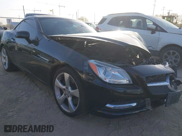 2013 Mercedes-Benz SLK-Class SLK 350 with VIN WDDPK5HA6DF054060, listed as a IAAI auction lot 41797807 with 84,877 mi miles. Bid and sale history available at carsss.com. Image 1.