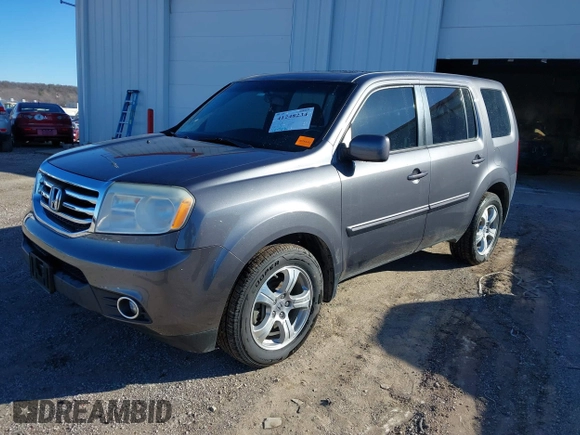 2015 Honda Pilot EX-L with VIN 5FNYF4H57FB063115, listed as a IAAI auction lot 41248234 with 187,752 mi miles and . Bid and sale history available at carsss.com. Image 18.