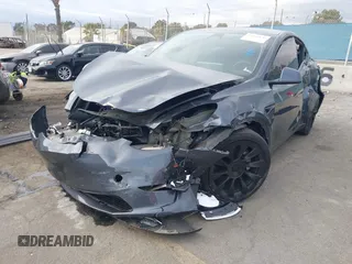 2023 Tesla Model Y Long Range with VIN 7SAYGDEE4PA028440, listed as a IAAI auction lot 41488136 with 29,229 mi miles and . Bid and sale history available at DreamBid. Image 18.