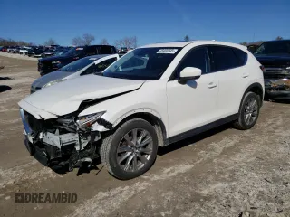 2021 Mazda CX-5 Grand Touring with VIN JM3KFBDM9M1426809, listed as a Copart auction lot 48468345 with 74,500 mi miles and Salvage Title. Bid and sale history available at carsss.com. Image 1.