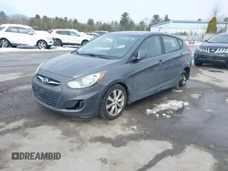 2012 Hyundai Accent SE with VIN KMHCU5AE4CU037411, listed as a IAAI auction lot 41659662 with 163,021 mi miles. Bid and sale history available at carsss.com. Image 2.