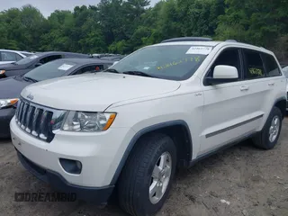 2011 Jeep Grand Cherokee Laredo with VIN 1J4RR4GG0BC670506, listed as a IAAI auction lot 42462778 with 241,406 mi miles and . Bid and sale history available at DreamBid. Image 2.