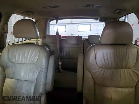 2009 Honda Odyssey EX-L with VIN 5FNRL38759B402158, listed as a Copart auction lot 52025715 with 239,340 mi miles and Salvage Title. Bid and sale history available at carsss.com. Image 10.