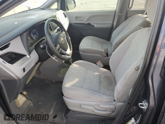2019 Toyota Sienna L with VIN 5TDZZ3DC3KS015479, listed as a Copart auction lot 79917304 with 81,487 mi miles and Salvage Title. Bid and sale history available at carsss.com. Image 7.