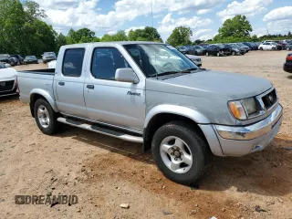 2000 Nissan Frontier XE with VIN 1N6ED27T8YC306716, listed as a Copart auction lot 55676965 with Not provided miles and Salvage title. Bid and sale history available at DreamBid. Image 4.