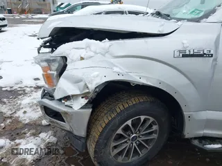 2018 Ford F-150 XL with VIN 1FTFW1E54JKC59793, listed as a IAAI auction lot 41558134 with 217,831 mi miles. Bid and sale history available at carsss.com. Image 17.