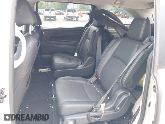 2023 Honda Odyssey Touring with VIN 5FNRL6H88PB079716, listed as a IAAI auction lot 42208628 with 26,679 mi miles and . Bid and sale history available at DreamBid. Image 8.