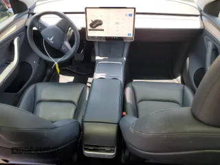 2024 Tesla Model Y Long Range with VIN 7SAYGDEEXRA253111, listed as a Copart auction lot 60929295 with 16,423 mi miles and Salvage title. Bid and sale history available at DreamBid. Image 8.
