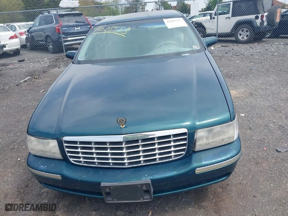 1999 Cadillac DeVille DHS with VIN 1G6KE54Y9XU766791, listed as a IAAI auction lot 42005553 with 140,515 mi miles. Bid and sale history available at carsss.com. Image 6.