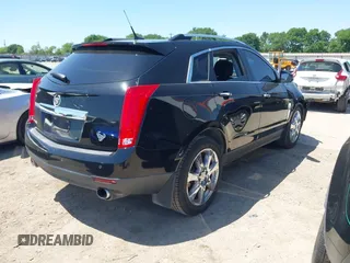 2011 Cadillac SRX Premium Collection z VIN 3GYFNCEY5BS597566, wystawiony jako IAAI lot #41983784 z przebiegiem 102 989 mil mil oraz . Historia ofert i sprzedaży dostępna na DreamBid. Obrazek 4.