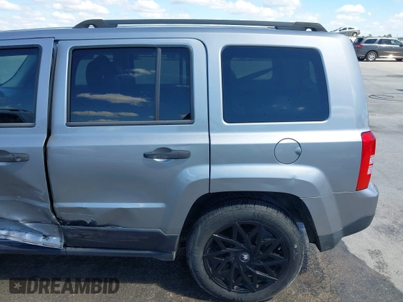 2014 Jeep Patriot Sport z VIN 1C4NJPBA7ED818830, wystawiony jako IAAI lot #42216964 z przebiegiem 144 909 mil mil oraz . Historia ofert i sprzedaży dostępna na DreamBid. Obrazek 17.
