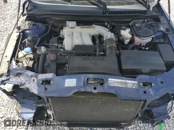 2004 Jaguar X-Type with VIN SAJEA51C44WD83361, listed as a Copart auction lot 55643545 with 54,615 mi miles and Salvage Title. Bid and sale history available at DreamBid. Image 11.