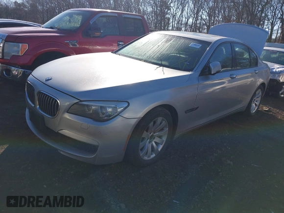 2014 BMW 7 Series 740i with VIN WBAYA6C54ED144450, listed as a IAAI auction lot 41680060 with 999,999 mi miles. Bid and sale history available at carsss.com. Image 17.