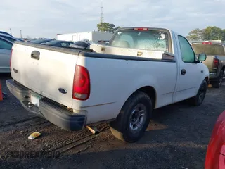 2002 Ford F-150 XL with VIN 1FTRF172X2NB18372, listed as a IAAI auction lot 41478280 with 240,736 mi miles. Bid and sale history available at carsss.com. Image 4.