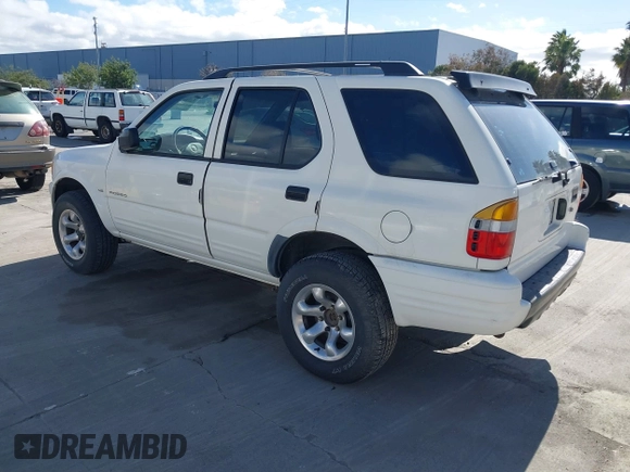 1998 Isuzu Rodeo S z VIN 4S2CK58W4W4308419, wystawiony jako IAAI lot #41711274 z przebiegiem 128 853 mil mil oraz . Historia ofert i sprzedaży dostępna na DreamBid. Obrazek 3.