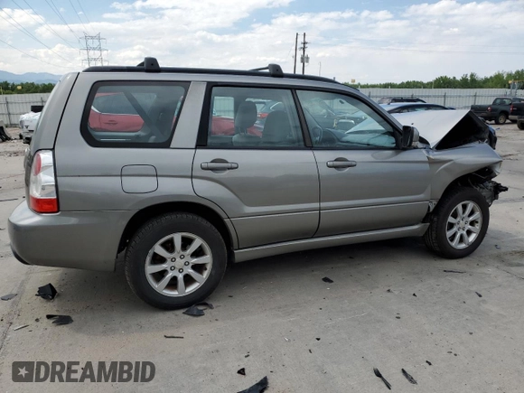 2006 Subaru Forester X with VIN JF1SG65656H709849, listed as a Copart auction lot 59811325 with 198,659 mi miles and Salvage title. Bid and sale history available at DreamBid. Image 3.