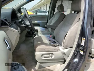 2006 Honda Odyssey EX with VIN 5FNRL38416B446272, listed as a Copart auction lot 57165545 with 219,042 mi miles and Salvage title. Bid and sale history available at DreamBid. Image 7.