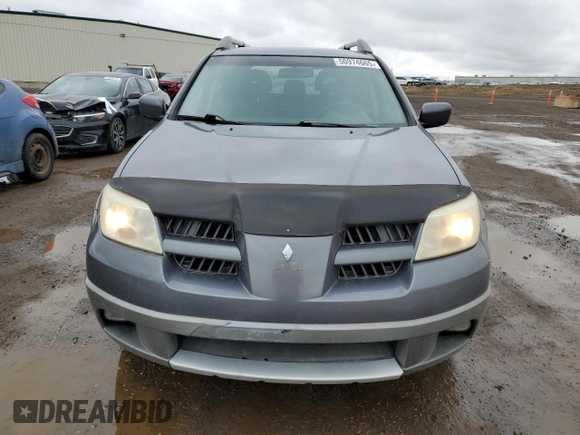2005 Mitsubishi Outlander z VIN JA4LZ41F75U601526, wystawiony jako Copart lot #50974665 z przebiegiem 265 611 mil mil oraz Szkoda całkowita • Salvage title. Historia ofert i sprzedaży dostępna na DreamBid. Obrazek 5.