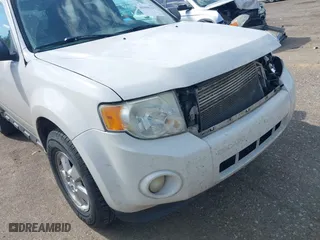 2010 Ford Escape XLT with VIN 1FMCU0DG3AKC46213, listed as a IAAI auction lot 41948197 with 167,761 mi miles. Bid and sale history available at carsss.com. Image 13.