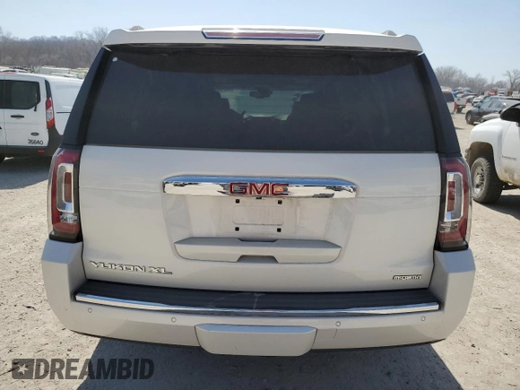 2015 GMC Yukon XL Denali with VIN 1GKS2JKJ3FR585809, listed as a Copart auction lot 48219925 with 191,102 mi miles and Salvage Title. Bid and sale history available at DreamBid. Image 6.