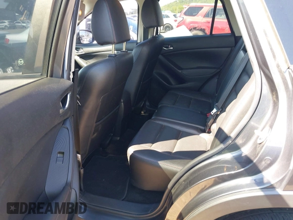 2014 Mazda CX-5 Grand Touring with VIN JM3KE2DY8E0383206, listed as a IAAI auction lot 40205756 with 120,231 mi miles. Bid and sale history available at carsss.com. Image 8.