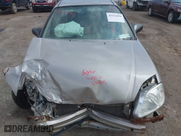 2000 Honda Civic LX with VIN 1HGEJ6670YL030749, listed as a IAAI auction lot 42112694 with 153,903 mi miles. Bid and sale history available at carsss.com. Image 12.