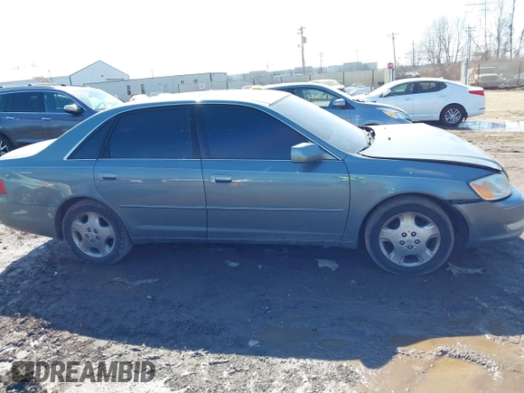 2003 Toyota Avalon XL z VIN 4T1BF28B33U293202, wystawiony jako IAAI lot #41768148 z przebiegiem 157 992 mil mil oraz . Historia ofert i sprzedaży dostępna na DreamBid. Obrazek 13.
