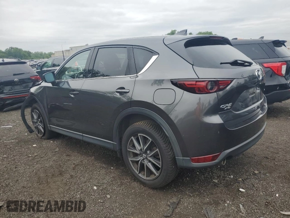 2018 Mazda CX-5 Grand Touring с VIN JM3KFBDM8J0424633, выставлен на аукционе Copart как лот 59888035 с пробегом 77 721 миль миль и Списание • Salvage title. История ставок и продаж доступна на DreamBid. Изображение 2.