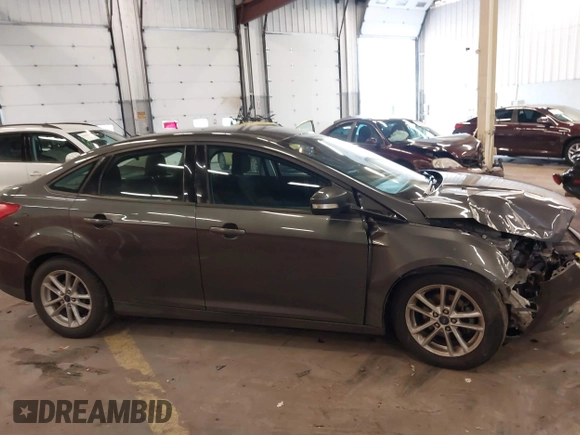 2015 Ford Focus SE with VIN 1FADP3F2XFL201554, listed as a IAAI auction lot 41817418 with 101,938 mi miles. Bid and sale history available at carsss.com. Image 14.