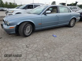 2005 Jaguar XJ VDP with VIN SAJWA82C45SG36059, listed as a Copart auction lot 69289734 with 0 mi miles and Salvage Title. Bid and sale history available at carsss.com. Image 1.