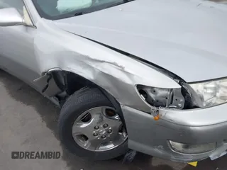 2000 Lexus ES 300 с VIN JT8BF28G7Y5093021, выставлен на аукционе IAAI как лот 42427386 с пробегом 134 897 миль миль и . История ставок и продаж доступна на DreamBid. Изображение 6.
