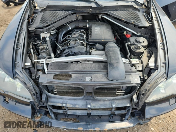 2012 BMW X5 35i with VIN 5UXZV4C5XCL765757, listed as a Copart auction lot 64497535 with 178,836 mi miles and Salvage title. Bid and sale history available at DreamBid. Image 12.