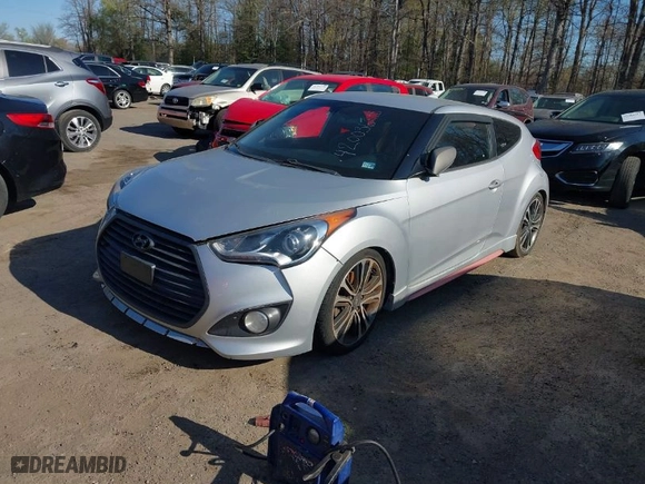 2016 Hyundai Veloster Turbo with VIN KMHTC6AE1GU254168, listed as a IAAI auction lot 42003625 with 92,868 mi miles. Bid and sale history available at carsss.com. Image 2.