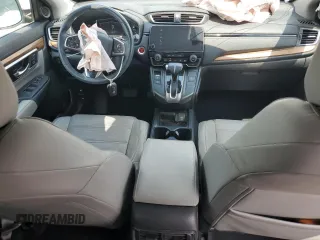 2018 Honda CR-V Touring with VIN 2HKRW2H9XJH605264, listed as a Copart auction lot 61500315 with 106,616 mi miles and Salvage title. Bid and sale history available at DreamBid. Image 8.