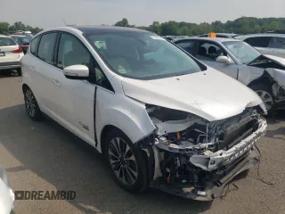 2017 Ford C-Max Energi Titanium with VIN 1FADP5FU3HL105023, listed as a Copart auction lot 65458784 with 64,443 mi miles and Salvage Title. Bid and sale history available at carsss.com. Image 4.