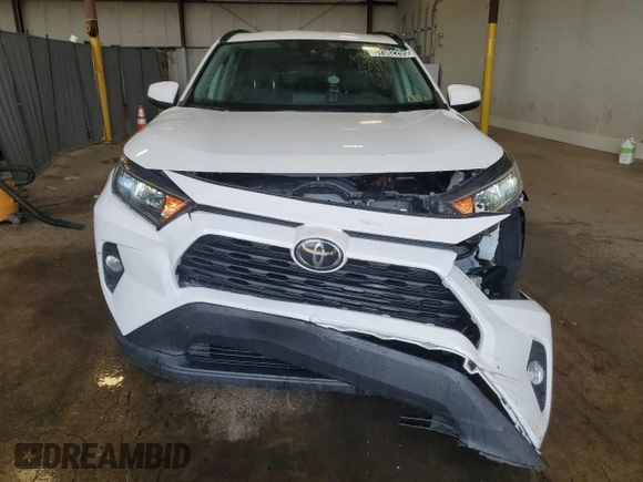 2020 Toyota RAV4 XLE with VIN 2T3W1RFV5LW065988, listed as a Copart auction lot 57382295 with 91,364 mi miles and Clean title. Bid and sale history available at DreamBid. Image 5.