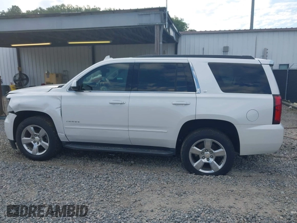 2017 Chevrolet Tahoe LT with VIN 1GNSKBKC3HR356480, listed as a IAAI auction lot 42335162 with 145,892 mi miles and . Bid and sale history available at DreamBid. Image 14.