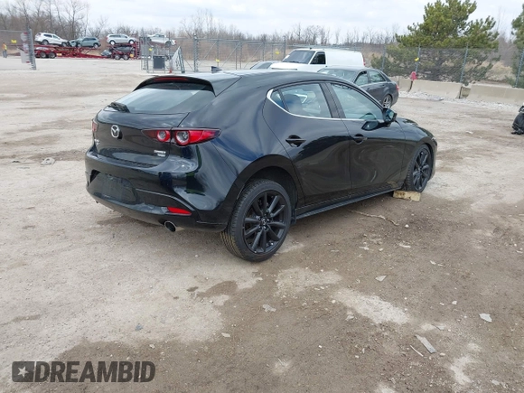 2021 Mazda 3 2.5 Turbo with VIN JM1BPBJY0M1344335, listed as a IAAI auction lot 42008145 with 71,452 mi miles and . Bid and sale history available at DreamBid. Image 4.