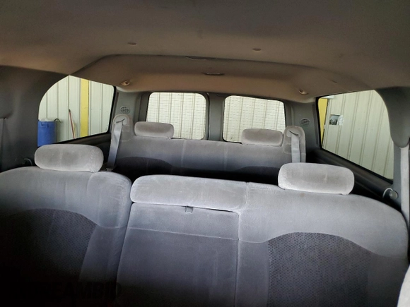 2000 Chevrolet Suburban LS with VIN 3GNEC16T9YG109043, listed as a Copart auction lot 77372784 with 228,042 mi miles and Salvage title. Bid and sale history available at DreamBid. Image 10.