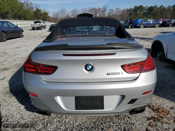 2012 BMW 6 Series 650i with VIN WBALZ3C54CDL72480, listed as a Copart auction lot 82797714 with 114,154 mi miles and Clean Title. Bid and sale history available at carsss.com. Image 6.