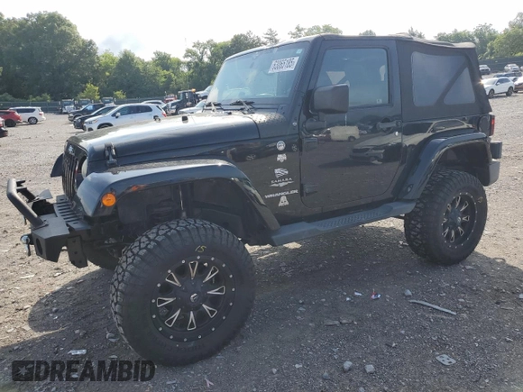 2011 Jeep Wrangler Sahara with VIN 1J4AA5D15BL552185, listed as a Copart auction lot 63065185 with 159,850 mi miles and Salvage title. Bid and sale history available at DreamBid. Image 1.