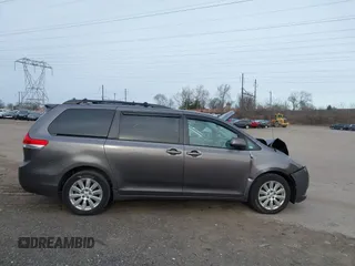 2014 Toyota Sienna LE with VIN 5TDJK3DC1ES087626, listed as a IAAI auction lot 41610813 with 142,311 mi miles and . Bid and sale history available at DreamBid. Image 13.