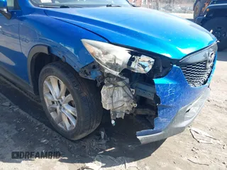 2013 Mazda CX-5 Grand Touring with VIN JM3KE4DE8D0151348, listed as a IAAI auction lot 41804074 with 145,120 mi miles. Bid and sale history available at carsss.com. Image 6.