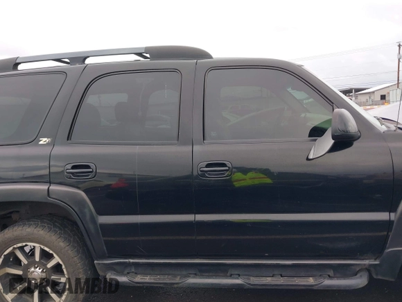 2004 Chevrolet Tahoe Z71 with VIN 1GNEK13T64R210008, listed as a IAAI auction lot 41641964 with 196,780 mi miles and . Bid and sale history available at DreamBid. Image 14.