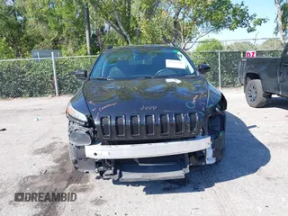 2016 Jeep Cherokee Latitude with VIN 1C4PJLCB6GW184264, listed as a IAAI auction lot 41783299 with 187,767 mi miles. Bid and sale history available at carsss.com. Image 6.