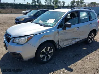 2017 Subaru Forester with VIN JF2SJABC1HH577623, listed as a IAAI auction lot 42061596 with 67,900 mi miles. Bid and sale history available at carsss.com. Image 2.