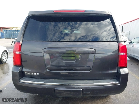 2015 Chevrolet Tahoe LTZ with VIN 1GNSCCKC8FR617540, listed as a IAAI auction lot 41356342 with 118,268 mi miles. Bid and sale history available at carsss.com. Image 16.