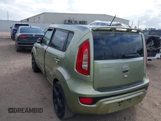 2012 Kia Soul + with VIN KNDJT2A69C7398380, listed as a IAAI auction lot 41523001 with 128,583 mi miles. Bid and sale history available at carsss.com. Image 3.