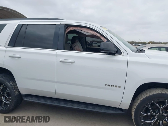 2015 Chevrolet Tahoe LT with VIN 1GNSCBKC4FR530776, listed as a IAAI auction lot 41754350 with 174,694 mi miles and . Bid and sale history available at DreamBid. Image 13.