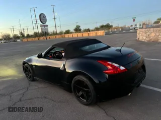 2014 Nissan 370Z Touring with VIN JN1AZ4FH1EM620177, listed as a Copart auction lot 54388235 with 107,509 mi miles and Salvage Title. Bid and sale history available at carsss.com. Image 3.